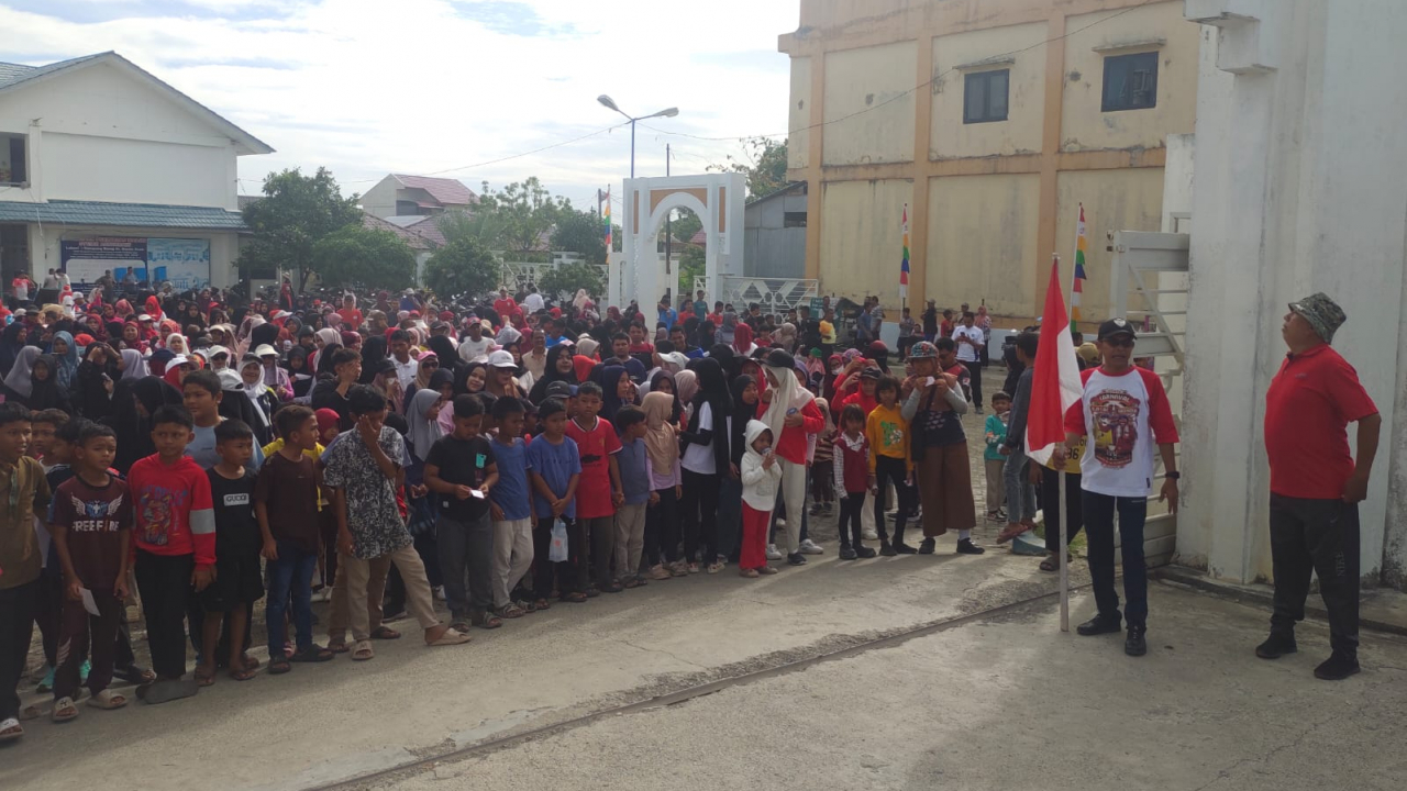 Jalan Santai Berhadiah Meriahkan HUT RI ke-80 di Gampong Blang Oi