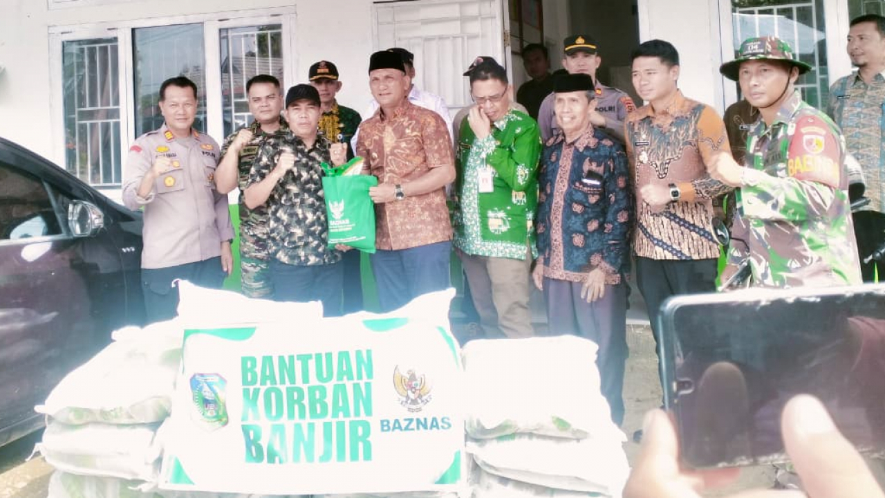 Kunjungan dan penyerahan bantuan Pasca Bajir di Desa Lidung Kecamatan Sarolangun Kabupaten Sarolangun