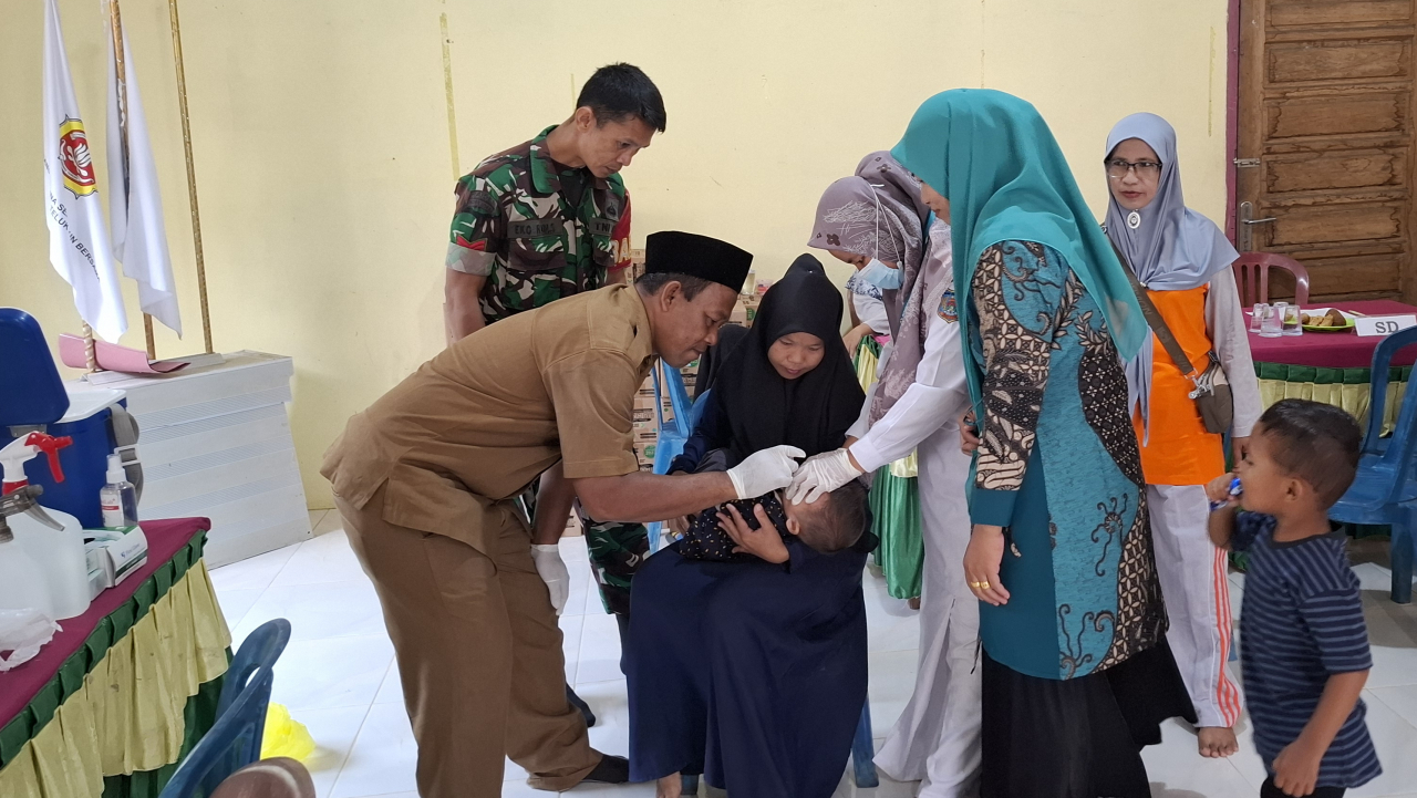 PIN PEKAN IMUNISASI NASIONAL  TETES POLIO SERTAK , DI DESA TELUK KULBI