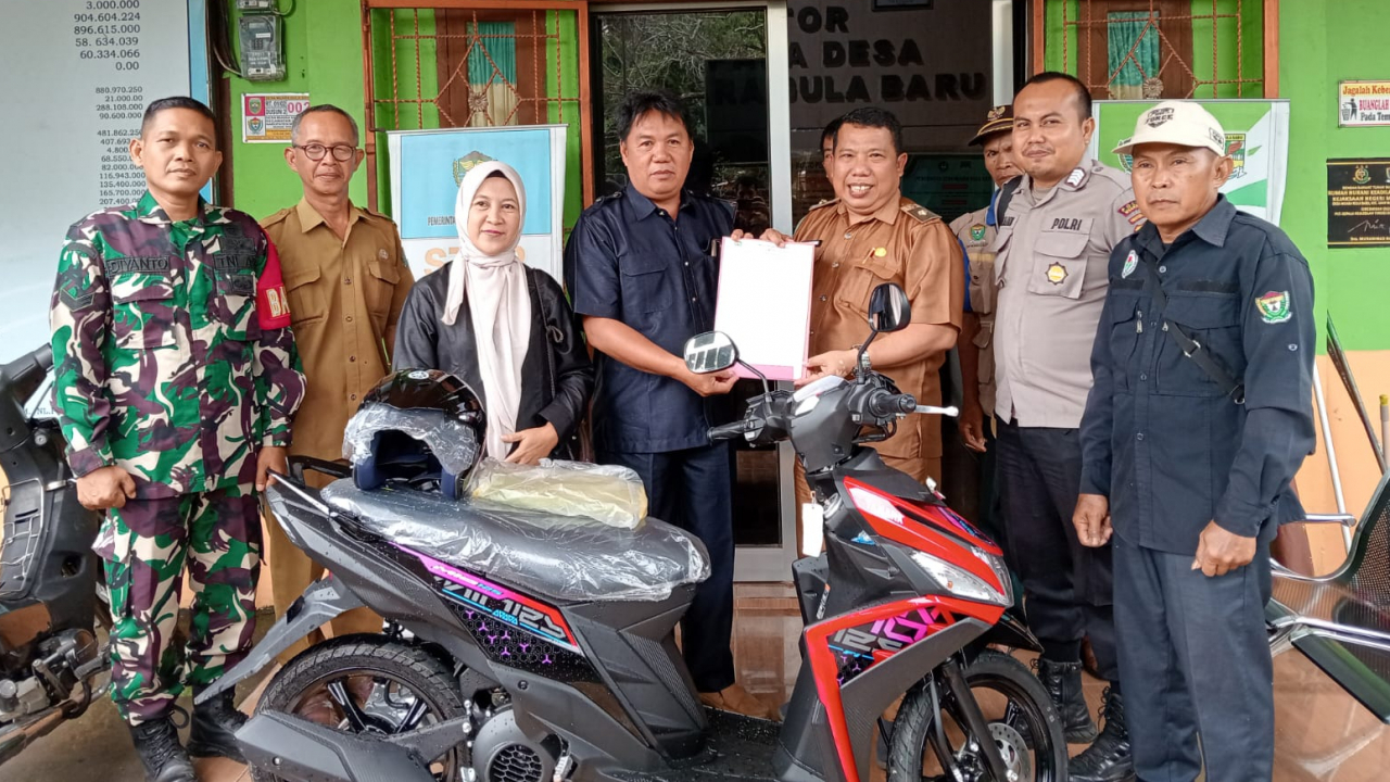 Pemdes Muara Gula Baru Serahkan Aset Desa Kendaraan Roda Dua ke BPD.