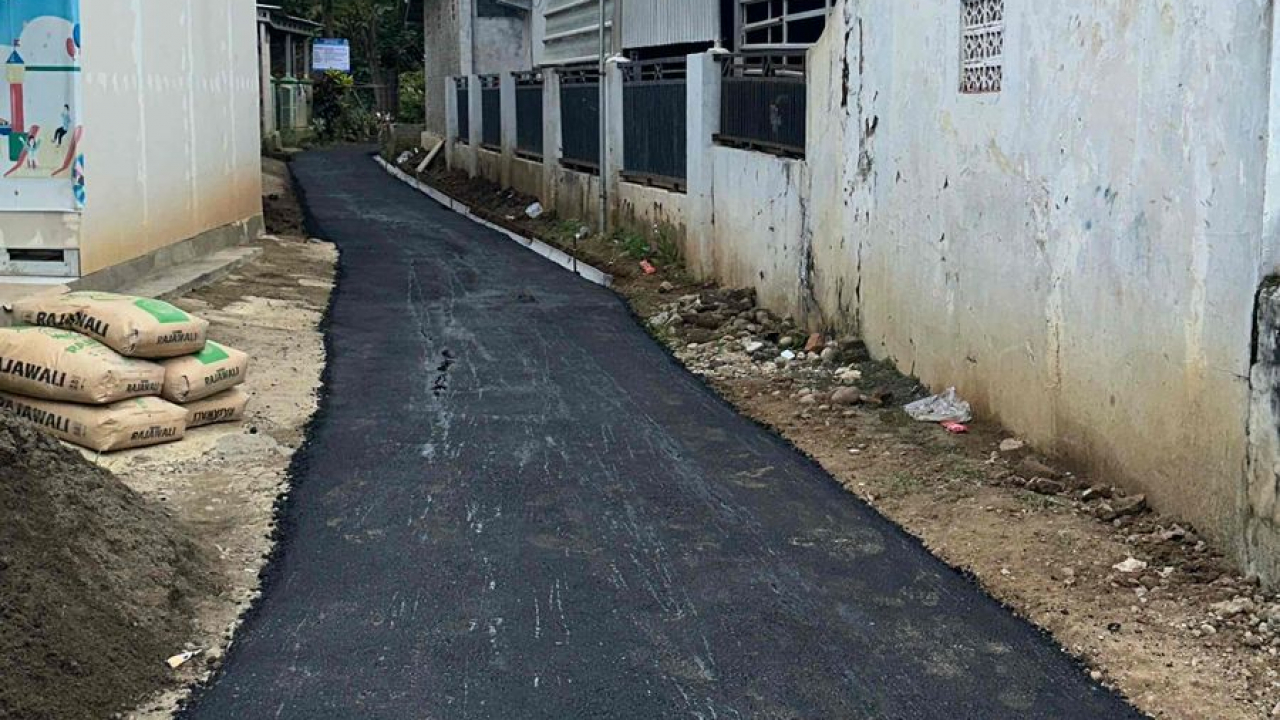 Peningkatan Infrastruktur Jalan Gang H. Nur di RT 005/RW 003 Desa [Nama Desa] melalui Dana Desa Tahun Anggaran 2025