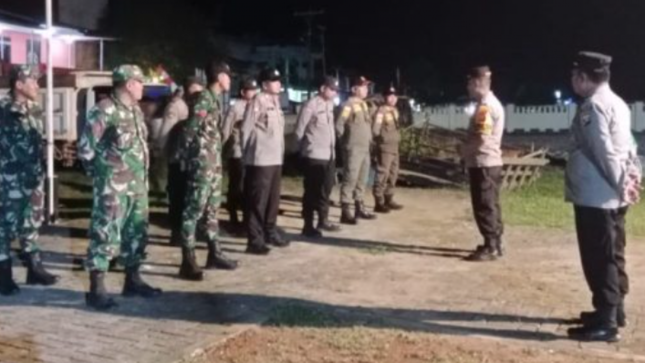 Kapolsek Jelai Hulu Pimpin Apel Gabungan dalam Rangka Cipta Kondisi Pilkades Serentak 2025