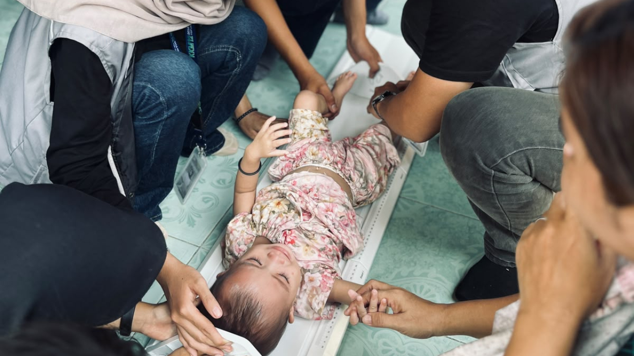 Kegiatan Posyandu Bougenvile Bersama Mahasiswa KKM FISIP UNTAN Pontianak  di Dusun Tungkul 1 Desa Hilir Kantor Kecamatan Ngabang Kabupaten Landak