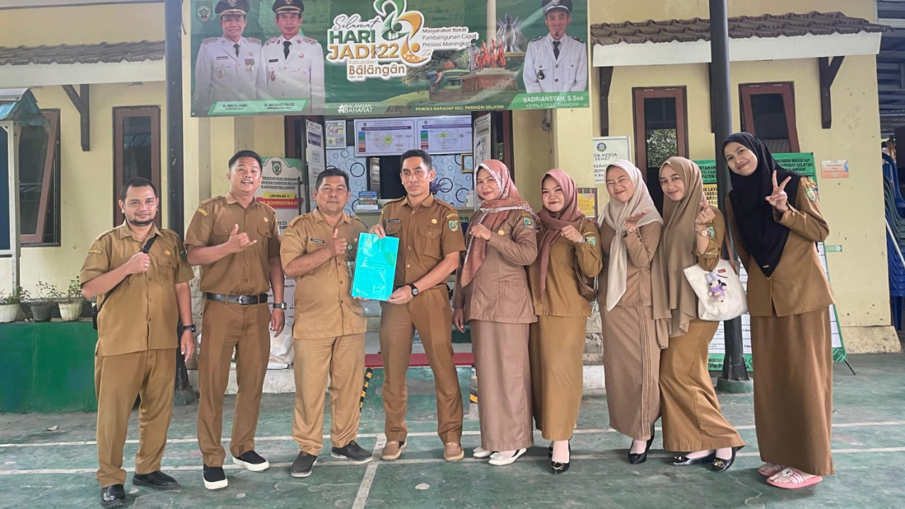 Pemerintah Desa Maradap Terima Dokumen Hasil Monitoring dan Evaluasi Pengelolaan Keuangan dan Aset Desa