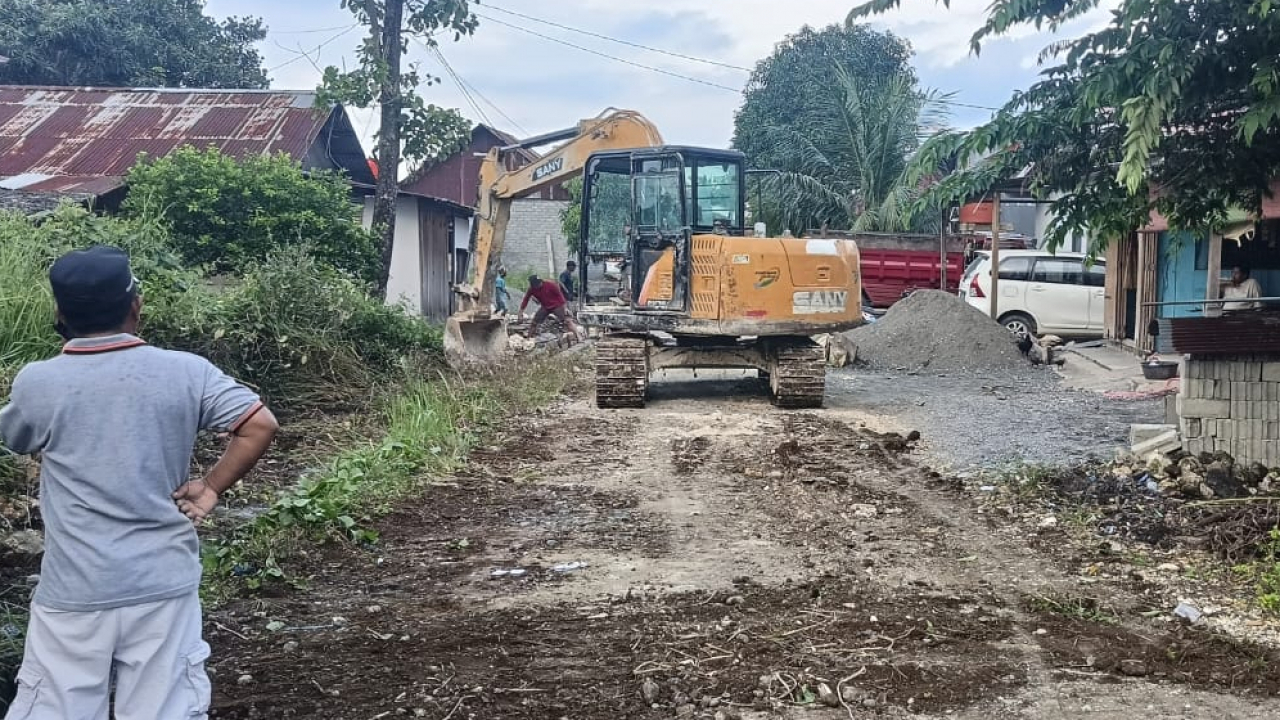 Perbaikan Infrastruktur Jalan di Dusun 1 Kampung Utama, Desa Topogaro