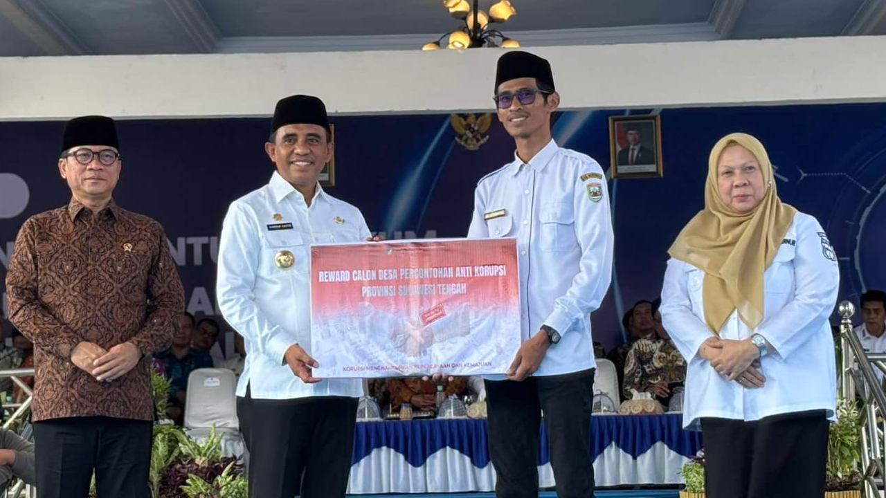 Desa Puntari Makmur Terima Reward Calon Percontohan Desa Anti Korupsi Provinsi Sulawesi Tengah