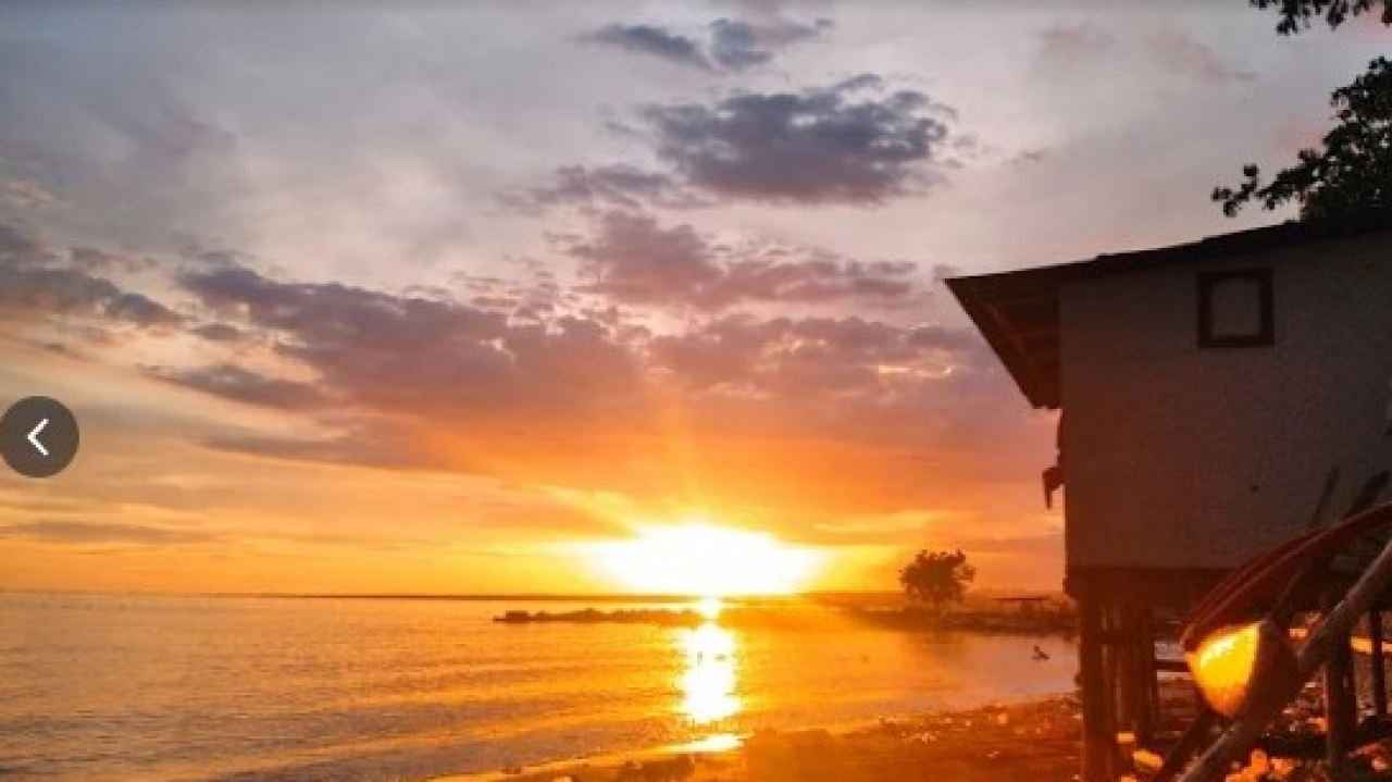 Lukisan Langit Jingga di Ufuk Selatan: Keindahan Senja Pantai Lamalaka Lembang Bantaeng