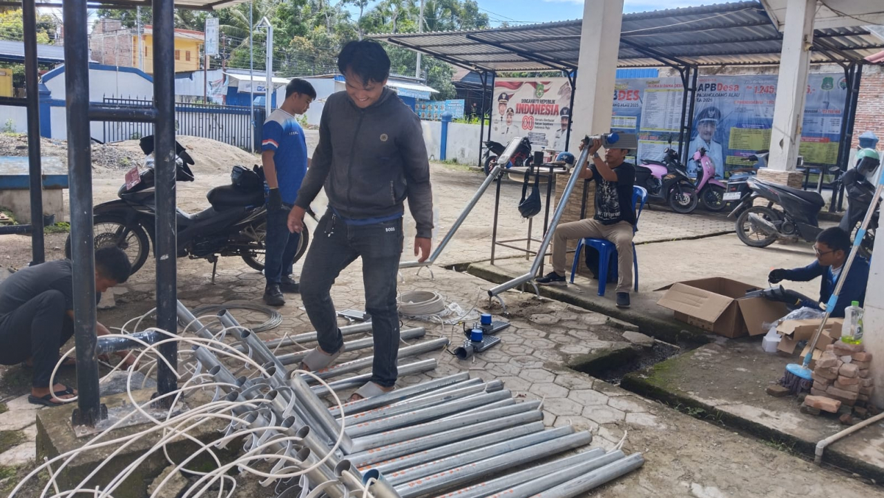 Lampu Jalan Terangi Desa Padangloang Alau, Tahap I Selesai