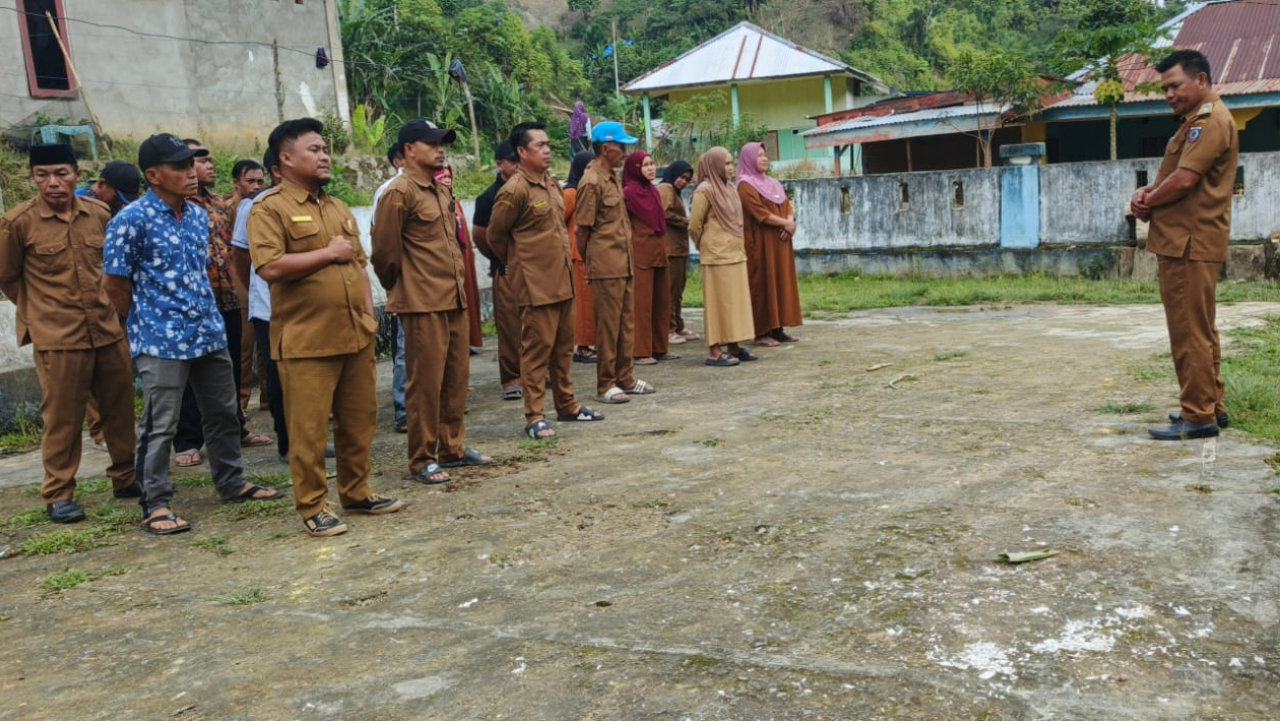 Optimalisasi Kinerja Aparatur Desa Melalui Apel Senin di Desa Salu Alo