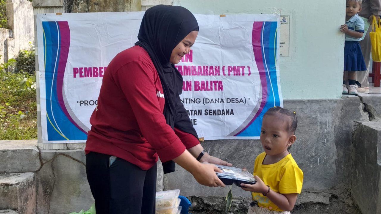 Posyandu Samusengana dan Pembagian PMT untuk Balita di Desa Bukit Samang